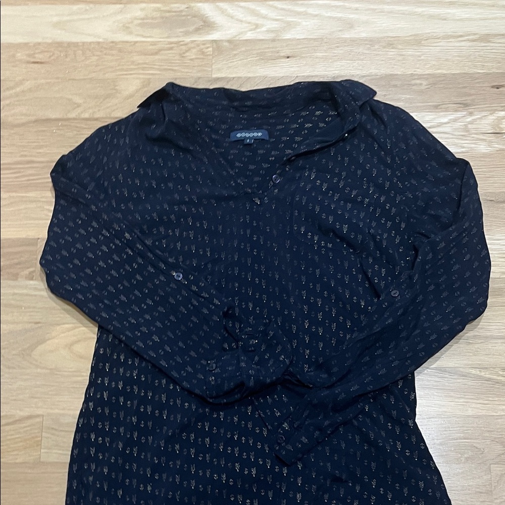 Elegant Black Blouse by [Brand]
